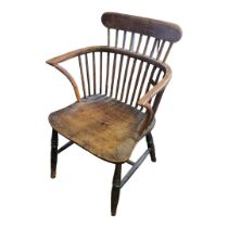 A 19TH CENTURY WELSH YEW AND ELM COMB BACK ARMCHAIR. (50cm x 46cm x 83cm) Condition: good overall,