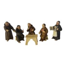 A SET OF FIVE EARLY 20TH CENTURY CONTINENTAL AMUSING PARIAN PORCELAIN FIGURES OF FRANCISCAN MERRY