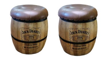 A PAIR OF IRON BOUND BARREL STOOLS With faux leather button back upholstered seat, branded ‘Jack