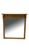 A LARGE 18TH CENTURY STYLE GILT FRAMED MIRROR With Adam swags and urns above a bevelled plate
