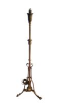 A VICTORIAN BRASS TELESCOPIC STANDARD LAMP Scrollwork paw feet. (130cm) Condition: later