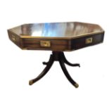 KENNEDY OF IPSWICH. A REGENCY STYLE MAHOGANY AND BRASS BOUND DRUM TABLE, the octagonal top fitted