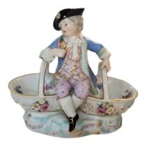 MEISSEN, A 19TH CENTURY HARD PASTE PORCELAIN FIGURAL PAIR OF SALTS Modelled in centre with an