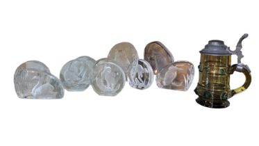 A SET OF FOUR WEDGWOOD CRYSTAL PAPERWEIGHTS Each carved to one side with English wildlife animals,