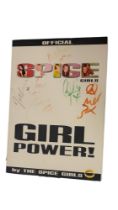 A SIGNED COPY OF THE 1997 OFFICIAL ‘GIRL POWER!’ PUBLICATION BY THE SPICE GIRLS All five