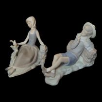 LLADRO, A PAIR OF EARLY PARIAN PORCELAIN FIGURAL GROUP, YOUNG BOY AND HIS COMPANION Surrounded by