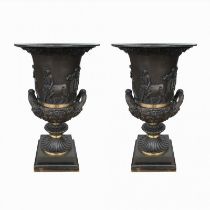 A PAIR OF BRONZE CAMPANA FORM URNS Cast with classical frieze of Bacchanalian revelry and acanthus