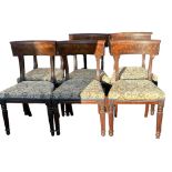 A SET OF SIX WILLIAM IV FLAME MAHOGANY DINING CHAIRS With overstuffed upholstered seat, on reeded