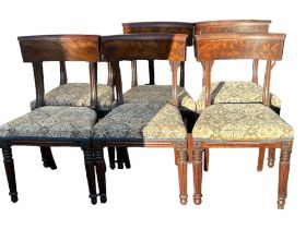 A SET OF SIX WILLIAM IV FLAME MAHOGANY DINING CHAIRS With overstuffed upholstered seat, on reeded