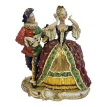 A FINE 19TH CENTURY CONTINENTAL PORCELAIN GROUP OF PIERROT AND COLUMBINE Attributed to Royal