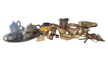 A COLLECTION OF EARLY 20TH CENTURY PEWTER AND SILVER PLATED WARE A planished four piece teaser