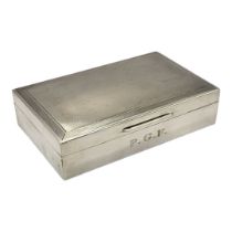 A VINTAGE SILVER RECTANGULAR CIGARETTE CASE With engine turned decoration, bearing engraved