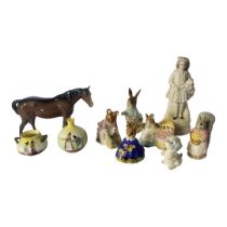 ROYAL DOULTON, WELSH SERIES, PORCELAIN WARE VASES A set of four Beswick Beatrix Potter models of