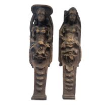 A PAIR OF 17TH CENTURY CARVED OAK CARYATIDS Half female form with grotesque masks. (approx 35cm)