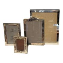 CARRS OF LONDON, A 20TH CENTURY SILVER RECTANGULAR PHOTOGRAPH FRAME Easel back, together with