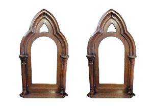 A PAIR OF 19TH CENTURY GOTHIC OAK FRAMED MIRRORS The pointed arched and central plate flanked by