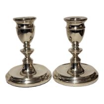 A PAIR OF HALLMARKED SILVER TABLE TOP CANDLESTICKS Birmingham, 1973, with knopped baluster stems,