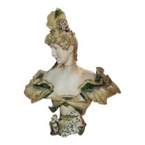 AN EARLY 20TH CENTURY ART NOUVEAU AUSTRIAN WIEN TEPLIZ PORCELAIN BUST OF A LADY With cherub at base.