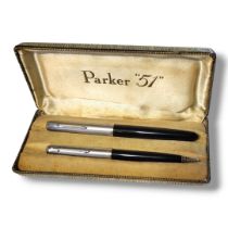 PARKER 51, A VINTAGE FOUNTAIN PEN AND PROPELLING PENCIL SET Steel and black resin set in fitted