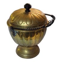 A LATE GEORGIAN/EARLY VICTORIAN BRASS COAL BUCKET/LOG BIN AND COVER With embossed fluted body,