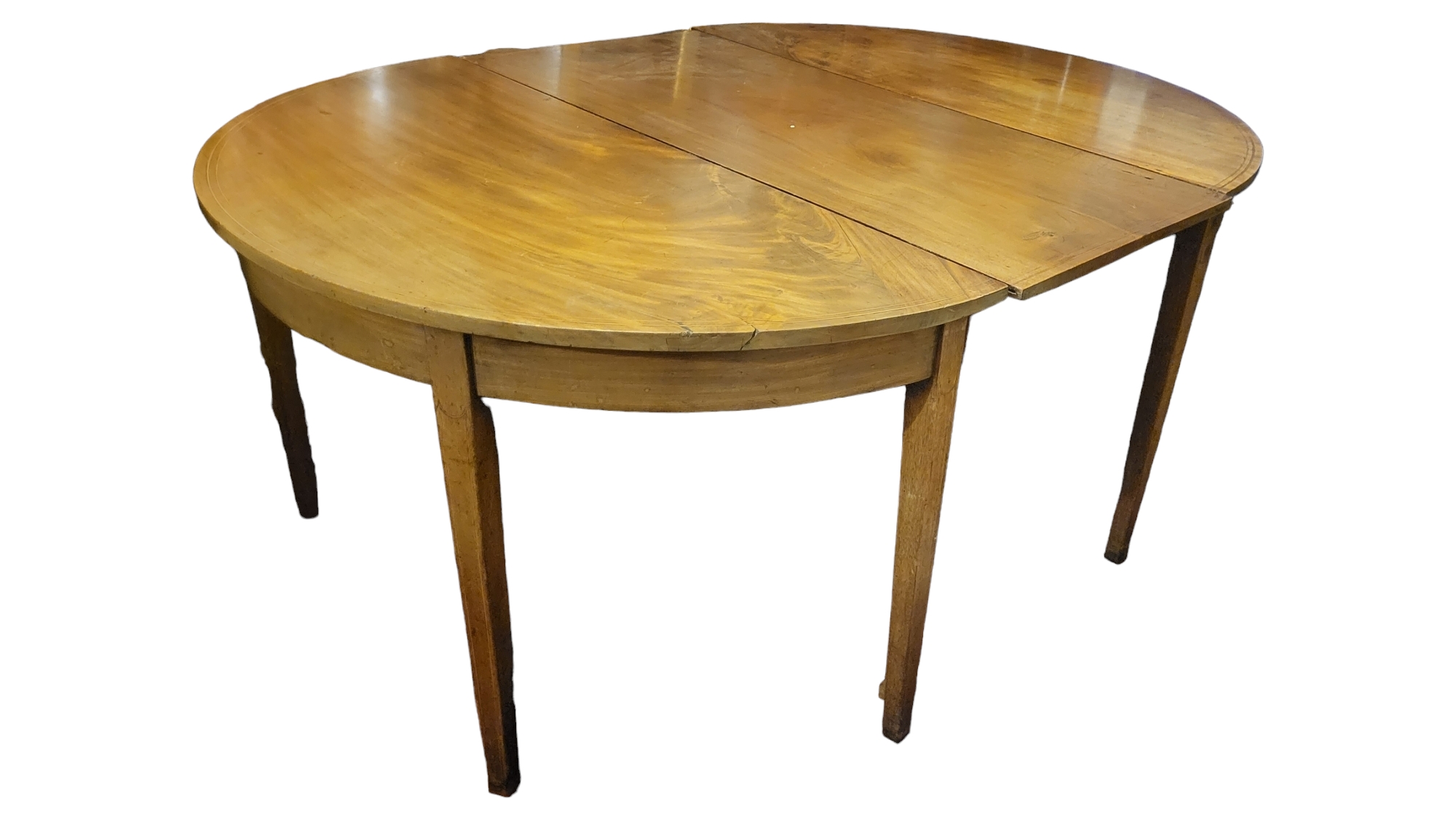 A REGENCY PERIOD SOLID MAHOGANY ‘D’ END DINING Complete with extra leaf, on square tapering legs. (