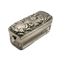 ASPREY, A VICTORIAN SILVER AND GLASS RECTANGULAR TRINKET BOX With embossed figural hinged lid,