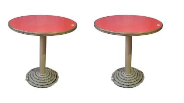 A PAIR OF STYLISH ART DECO DESIGN CAFE TABLES With red circular tops raised on single columns