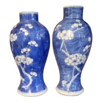 TWO EARLY 20TH CENTURY CHINESE BLUE AND WHITE PORCELAIN VASES Hand painted decoration of prunus