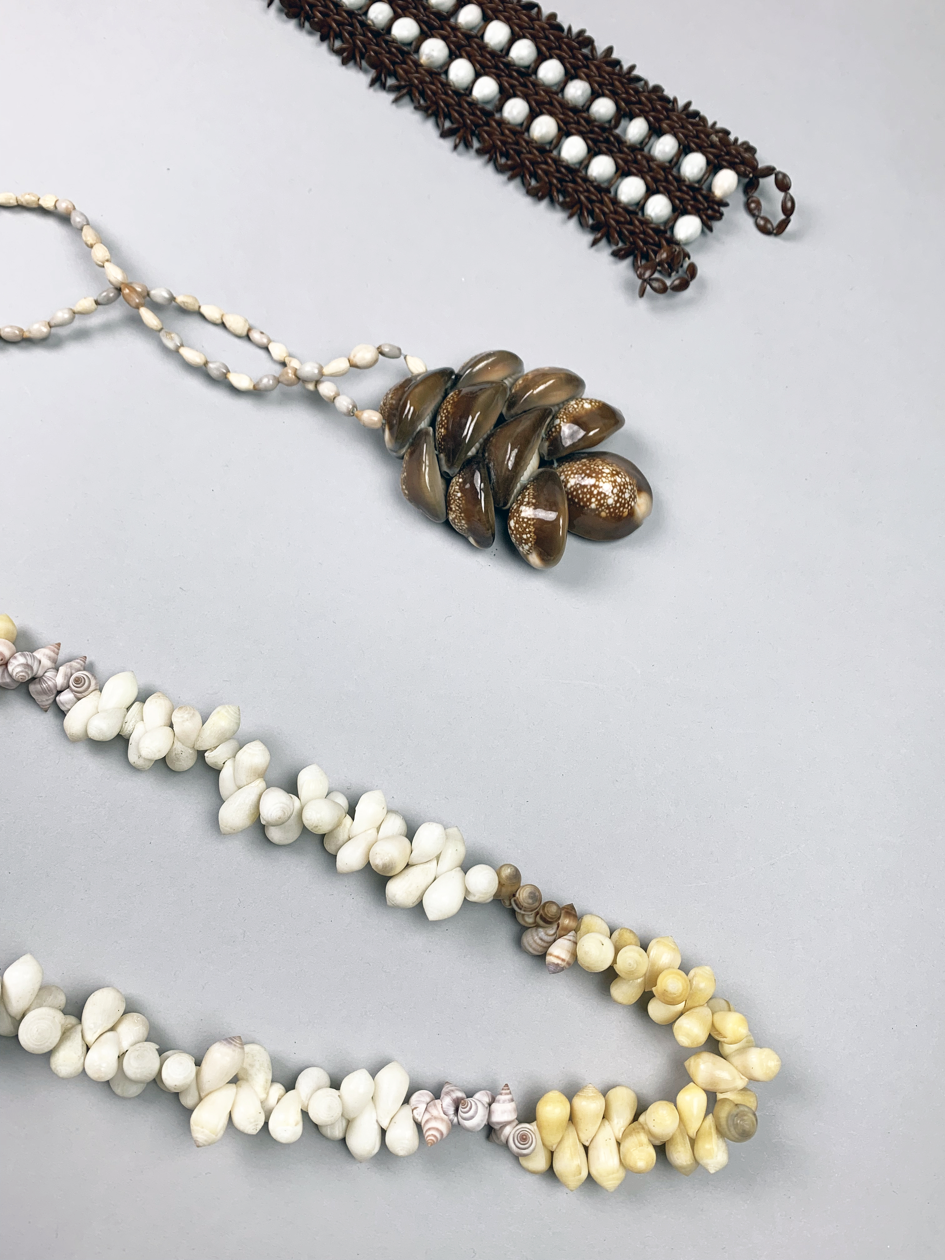 TWO SOLOMON ISLANDS SEASHELL NECKLACES AND A SEASHELL BELT. Provenance: Private English - Image 2 of 2