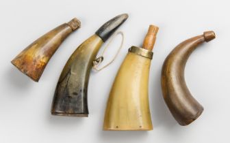 A COLLECTION OF FOUR ANTIQUE HORN POWDER FLASKS