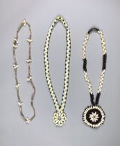 A COLLECTION OF THREE SOLOMON ISLANDS SEASHELL NECKLACES. Provenance: Private English collection,