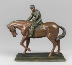 A LATE 20TH CENTURY CAST METAL BRONZED JOCKEY UPON HORSE SCULPTURE.