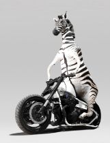 “THE ZEBRA BIKER” BY ANDRE ROBOLOBAVICH AND SIMON THE STUFFA. A full mount taxidermy Burchell's