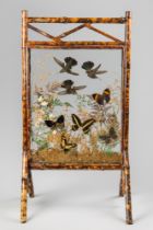 A LATE 19TH CENTURY BAMBOO FRAMED TAXIDERMY FIRE SCREEN DIORAMA. Comprising of hummingbirds and