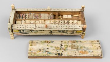 A 19TH CENTURY PRISONER OF WAR DOMINOES SET. (h 6.5cm x w 23cm x d 6cm)