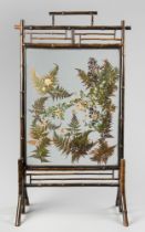 IN THE MANNER OF ROWLAND WARD, A LATE 19TH CENTURY BAMBOO FRAMED FIRE SCREEN DIORAMA WITH ORIGINAL