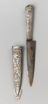 A 19TH CENTURY BELT DAGGER WITH ORNATE SILVER SCABBARD AND HANDLE. Name engraved to blade.