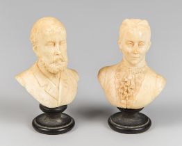 A PAIR OF 19TH CENTURY IVORINE MINIATURE PORTRAIT BUSTS OF EDWARD VII AND QUEEN ALEXANDRA.