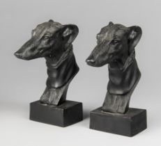 A PAIR OF 20TH CENTURY BRONZE WHIPPET HEAD BOOKENDS.