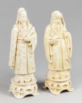 A PAIR OF 20TH CENTURY CHINESE IMITATION IVORY WISE MEN FIGURINES Composite.