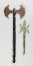 AN IMITATION ANCIENT BRONZE ARTIFACT AND A MID/LATE 20TH CENTURY FILM PROP DOUBLE AXE. Possibly a
