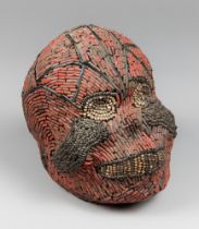 AN EARLY 20TH CENTURY ATWONZEN BEADED HEAD, GRASSLAND PEOPLE, CAMEROON. (h 20.5cm x w 23cm x d 17cm)