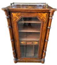 A VICTORIAN MAHOGANY AND INLAID MUSIC CABINET With glazed door opening to reveal shelf interior. (