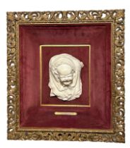 A 19TH CENTURY CARVED PORTRAIT BUST OF A BABY CRYING IN SHAWL, TITLED ‘THE PIN THAT PRICKS’ FROM THE