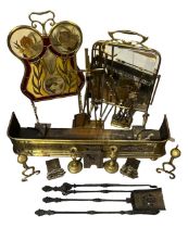 A COLLECTION OF 19TH CENTURY BRASS AND COPPER FIRE ITEMS To include stained glass screen fire irons,