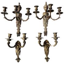 TWO PAIRS OF FRENCH GILT BRONZE LOUIS XVI DESIGN WALL SCONCES Decorated with shells and urns. (