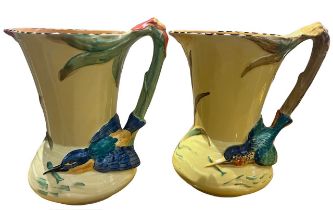 BURLEIGH WARE, POTTERY, TWO ART DECO KINGFISHER JUGS, CIRCA 1930 All having yellow ground,