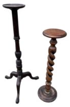 A 19TH CENTURY CHIPPENDALE DESIGN MAHOGANY TRIPOD TORCHÈRE STAND Together with another barley