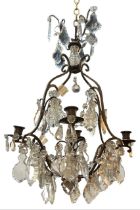 A DECORATIVE FRENCH LOUIS XV DESIGN GILT ORMOLU AND CRYSTAL GLASS FOUR BRANCH CHANDELIER. (drop 64cm