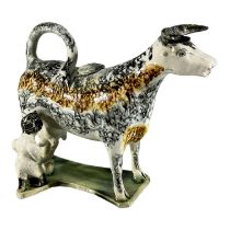 LATE 18TH/ EARLY 19TH CENTURY STAFFORDSHIRE/ YORKSHIRE PEARLWARE COW CREAMER AND MILKMAID Sponge